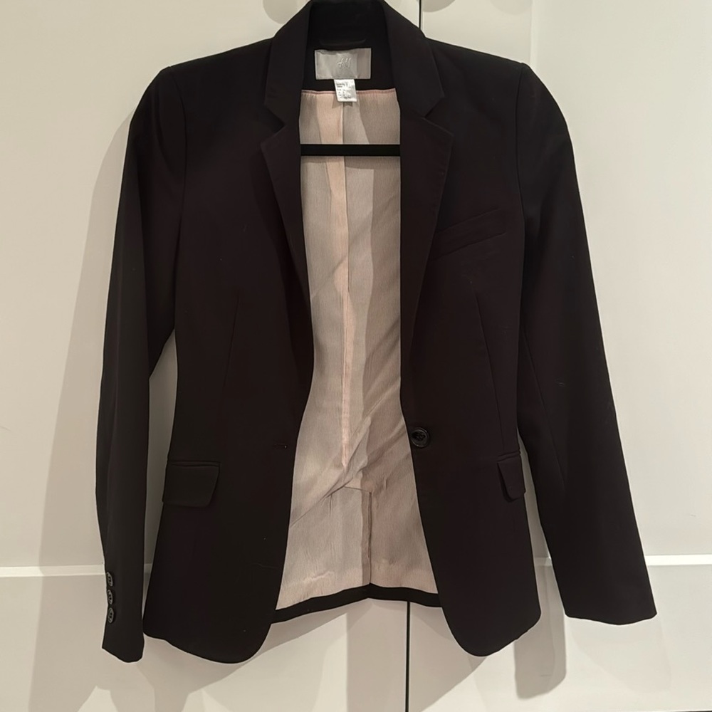 Classic plain black blazer in a size 2